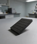 Heavy Duty Foam Router Bit Storage Organizer Tray Featuring 110 Snug Cutouts For 1/4 Inch And 1/2 Inch Shank Bits, showing dense foam with cutouts.
