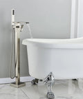Top Notch Freestanding Bathtub Faucet Floor Mount Tub Filler with Waterfall High Flow Spout and Shower Mixer Faucet Brushed Nickel Brass Construction with Hand Shower next to a clawfoot bathtub.