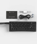 Blazing Fast 8000Hz Polling Rate Wired Gaming Keyboard Featuring Crisp Magnetic Analog Switches And Snappy Zero Lag Performance For Ultimate 60 Percent Compact Rig Setup And Next Level Ultra Quick Actuation, top view with accessories.