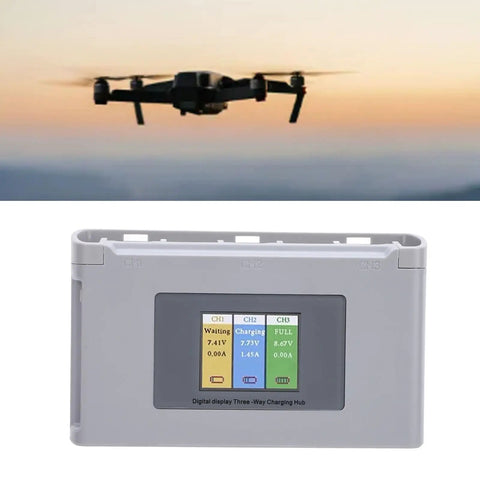 Three Slot Drone Charging Hub with Digital Display ABS Shockproof Build and Fast 5V 8A Output shown next to flying drone