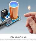 Mini Coil Kit Module With LED Light DC 9 To 12V Power Transmission for DIY electronics, hands holding LED near coil.