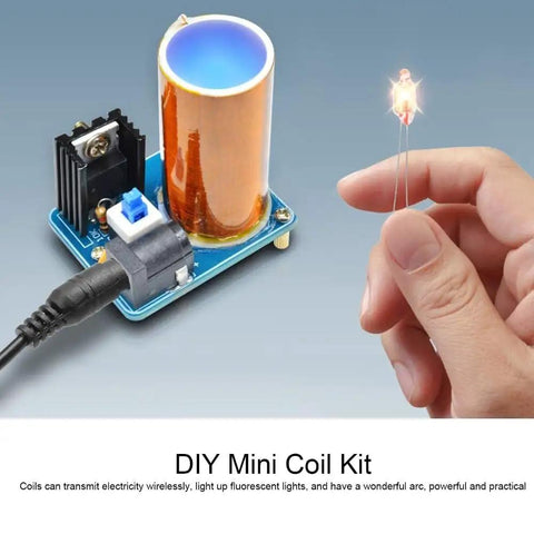 Mini Coil Kit Module With LED Light DC 9 To 12V Power Transmission for DIY electronics, hands holding LED near coil.