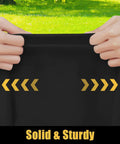 Hands stretching a black Waterproof Elastic Fitted Table Cloth For 6 Foot Tables Washable Polyester Table Cover For Picnic And Outdoor Use