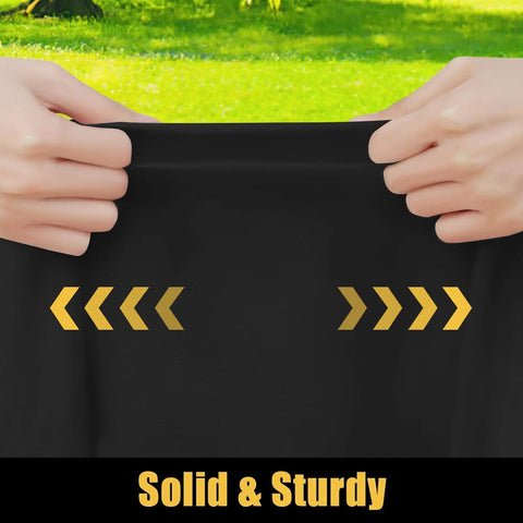 Hands stretching a black Waterproof Elastic Fitted Table Cloth For 6 Foot Tables Washable Polyester Table Cover For Picnic And Outdoor Use
