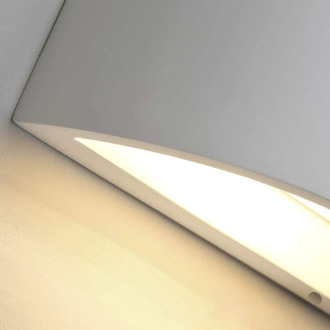Close-up of Dope LED Wall Sconce Light 7W Warm White 2700K up and down plaster finish indoor wall lamp in use