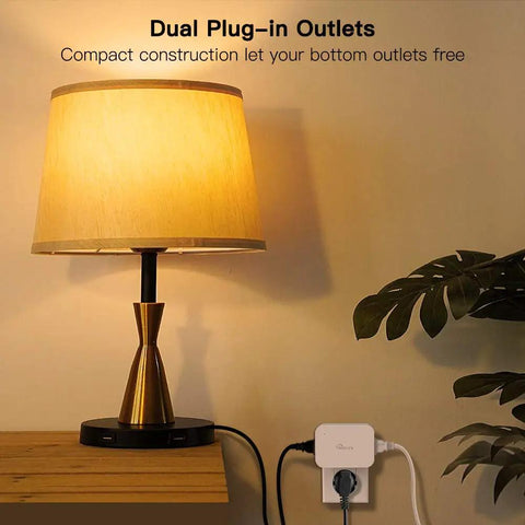 Dimmable Smart Plug 2 Pack With Sunrise And Sunset Simulation shown connected to lamp on wooden table near plant
