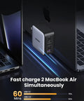 GaN 100W USB C Charger With Four Ports, Ultra Compact Foldable Power Adapter For Laptops and Phones On the Go, Fast 100W Charging For MacBook Pro and Air, iPad Pro, iPhone 17 16 15 Series, Galaxy S25 S24, Pixel 10 9, Steam Deck, Pixelbook. Compact 4-port charger mounted beside MacBook Air
