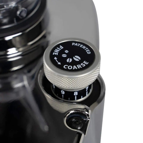 Close-up of Rock Solid Hella Quiet Espresso Grinder adjustment knob for grind size with chrome finish.