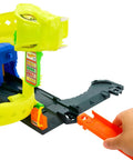 Snake Spiral Attack Toy Car Track Set with hand loading track piece into corkscrew loop.