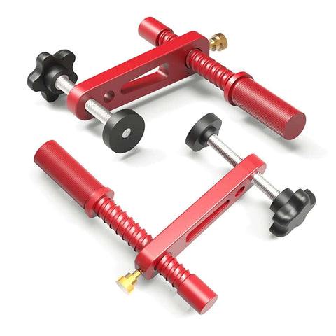 20mm Clamp Set With Protective Pads For Woodworking On A Sturdy Aluminum Alloy Workbench, close-up of red clamps with black knobs