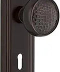 Old School Deco Plate With Keyhole And Craftsman Knob Privacy Door Hardware Set, Brass Timeless Bronze Finish, side view.