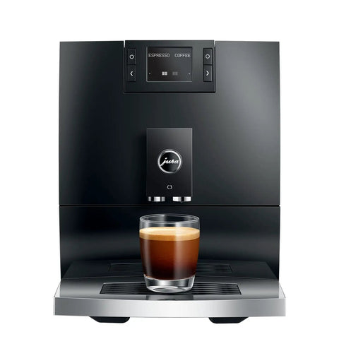 Top Shelf Automatic Coffee Machine In Sleek Piano Black Featuring Fresh Aroma Grinder PEP Brew Tech Dual Cup Options And Killer Crema presented with espresso in a glass.