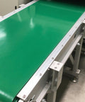 Workhorse PVC Conveyor Belt For Assembly Lines And Warehouse Workflows Durable Flat Drum Belt 10x370cm in action