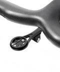 Close-up of Aero Integrated Out Front Handlebar Mount System for Bikes, CNC 6061 T6 Aluminum, attached to curved handlebars.