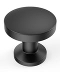 Top view of a single matte black cabinet knob from the 10 Pack 1-1/5 Inch (30mm) Cabinet Knobs Matte Black For Cabinets, Dresser, And Kitchen Drawers.