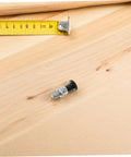 Built Tough Stainless Steel Reset Spring Plunger Featuring Self Locking Control Knob And Rapid Return Indexing Pin on wooden surface.