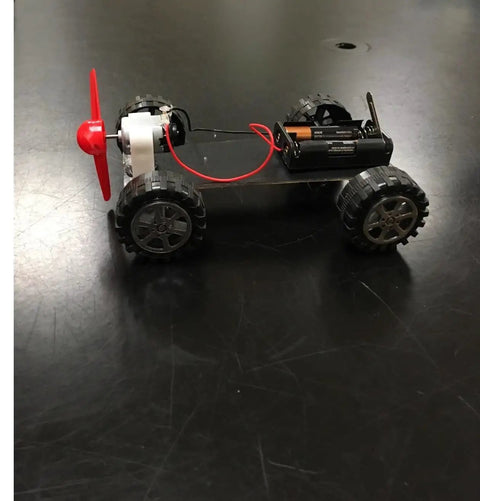 Ultra Tiny High RPM Micro DC Motor Kit For DIY Projects 1.5 To 3 Volt Operation 16000 To 18000 RPM car setup with red propeller