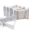 Disposable Paper Tape Measure for Medical Use 40 Inch by Three Quarter Inch Write On Tape for Recording Patient Info Baby Head Circumference Ruler Eco Friendly Coated Paper Pack of 100, stacked and bound with elastic bands.
