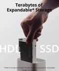 Hand inserting SATA SSD drive into Home Security Hub With 16TB Expandable Local Storage, Edge Security Center For Up To 50 Cameras.