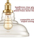 Close-up of Brass Gold Glass Dome Pendant Lights Set Of 3 For Kitchen Island with handblown clear glass and brass finish