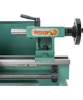 Close-up view of the Grizzly Industrial 7X12 Inch Mini Metal Lathe, showcasing precision machining components and variable speed drive features.