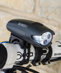 Beamer 3 Bike Headlight With Nichia LEDs Long Run Time Up To 100 Hours 220 Degree Visibility IPX6 Water Resistant, mounted on handlebar