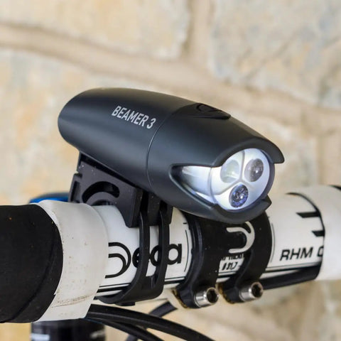 Beamer 3 Bike Headlight With Nichia LEDs Long Run Time Up To 100 Hours 220 Degree Visibility IPX6 Water Resistant, mounted on handlebar
