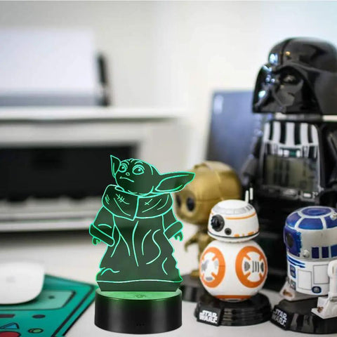 Four Pattern 3D Illusion Lamp With Sixteen Color LEDs Timed Remote Realistic 3D Night Light in character shape on desk