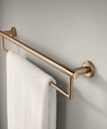24 Inch Towel Bar And Assist Bar In Champagne Bronze, Contemporary Style, Seven Eighths Inch Diameter, Extends 3 Inches From Wall, Supports Over 250 Pounds, Mounting Hardware Included For Easy Install holding white towel