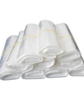 No Sweat Clear Pof Heat Shrink Wrap Bags 100 Piece Pack For Effortless Diy Packaging And Craft Projects 5.1X7.9 Inch transparent cellophane rolls stacked.