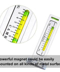Adjustable Magnetic Camber Gauge Tool For Vehicle Suspension And Wheel Alignment, showing close-up of levels and scale.