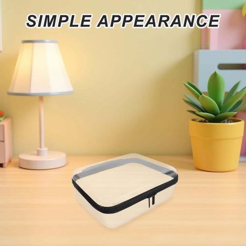 Built Different Clear Hard Shell Zipper Case For Travel Toiletries And Makeup Organizer on a wooden table with soft lighting.