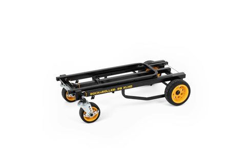 Eight In One Equipment Cart With Adjustable Height From 38 To 60 Inches Foldable Sides Textured Powder Coated Bed Non Slip Surface Quick Release Cables And Rugged Front Axle For Easy Tool Haul And Gear Transport in folded position showing wheels and frame