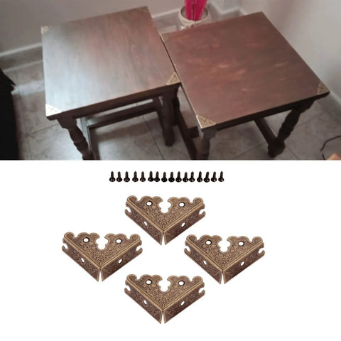 Four Pack Slick Antique Bronze Corner Protectors Heavy Duty Zinc Alloy Edge Guards For Furniture Tables And Wooden Boxes arranged with screws
