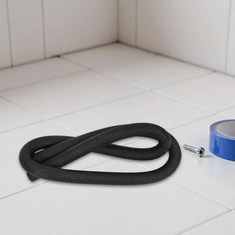 Pro Level Black Foam Backer Rod For Rock Solid Gap Sealing And Expansion Joint Filler With Heavy Duty Closed Cell Structure For Driveways Patios And Concrete Caulking Projects on tiled surface with tape.