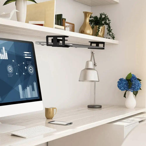 Under Desk Laptop Mount With Adhesive And Screws Aluminum Shelf Holder installed under a desk with accessories in an office setting