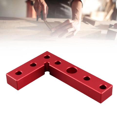 Orange Aluminum Alloy Self Centering Dowel Drill Guide And Center Scriber in use on woodworking project