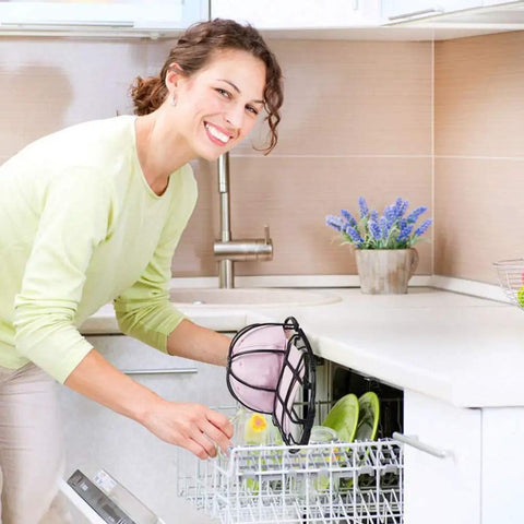 Person placing hat in dishwasher using 2 Pack Hat Washer Cage For Washing Machine And Dishwasher, Hat Cleaner Frame.