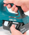 Detail of Badass 36V Cordless Leaf Blower Kit with 18V batteries being installed for optimal power.