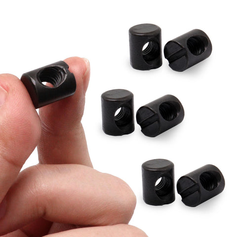 Close-up of hand holding barrel nuts for Crib Screws Replacement Set Delta Hex Socket Cap Bolts Barrel Nuts Baby Bed Hardware Replacement Kit