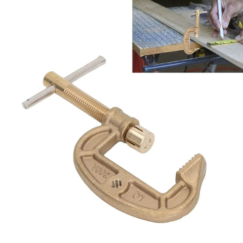 Check Out This Heavy Duty Brass Welding Ground Clamp That Cranks Up To 300 Amps For Serious Gas And Argon Arc Work. The Solid G Style Earth Grip Holds Firm Like A Boss In Any Rig Or Shop Setup You Got. A close-up of a solid brass welding ground clamp with a G style grip.