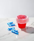 Lock Tight Plastic Garbage Bin Clips With Textured Anti Slip Grip Kick The Slipping Habit And Keep Kitchens Fresh Secure Trash Bag Holders 10 Pack on red container with pink liner.