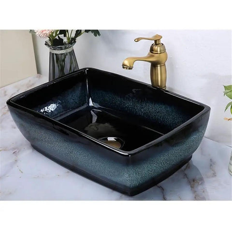USZWBY Rectangular Ceramic Vessel Sink for Bathroom Vanity with Modern Countertop Installation Easy Simple Retro Luxury Light Grey Basin on marble counter with gold faucet.