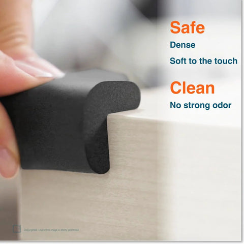 4 Large Corner Protectors For Baby Safety Heavy Duty Childproofing Rubber Foam Bumper Guards Adhesive Pre-Taped Black Onyx being applied.