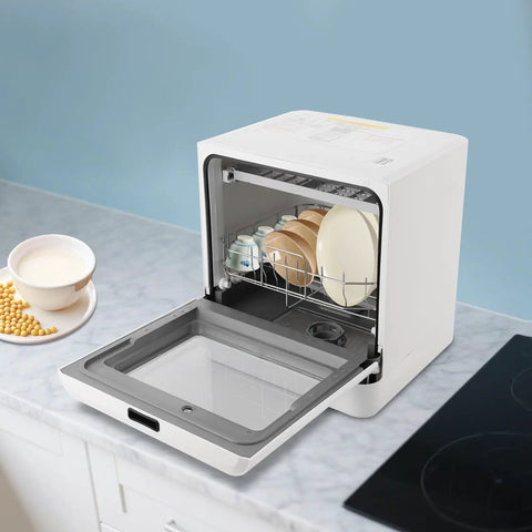 Compact Countertop Dishwasher 1.8 Gallon Capacity Plug And Play Portable Unit With Four Efficient Wash Cycles Slick White Finish, open with dishes inside.