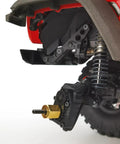 Close-up of a 1/10 RC car with Four Brass 13mm Extended Wheel Hubs With Steel Stub Axles For 1 Tenth RC Crawler Upgrades