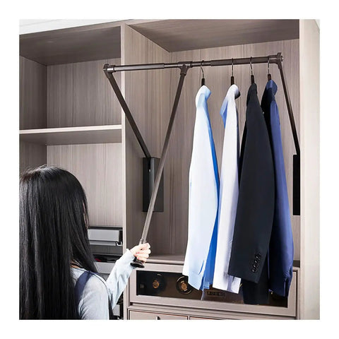 Woman using Retractable Pull Down Closet Rod For Hanging Clothes With Smooth Two Way Hydraulic Damping Adjustable Wardrobe Hanger.