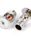 Pack Of Ten Tough As Nails Fire Sprinkler Heads With Rock Solid 20MM Male Thread And Straight Up Reliable 5MM Glass Bulb For Dependable Home Plumbing And Industrial Water Safety Systems In Classic Red Metal - close-up of chrome sprinkler heads.