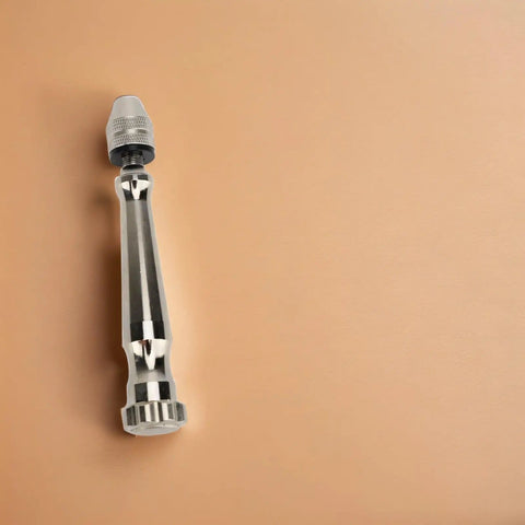 Pin Vise Hand Drill Kit With Aluminum Alloy Manual Small Drill on a neutral background