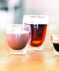 Real Deal Double Walled Espresso Glasses Set Of 2 Insulated Borosilicate Shot Cups Clear Heat Resistant Coffee Cup showing three types of drinks.